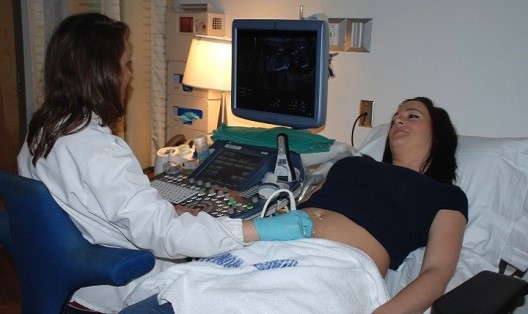 Patient in bed with ultrasound